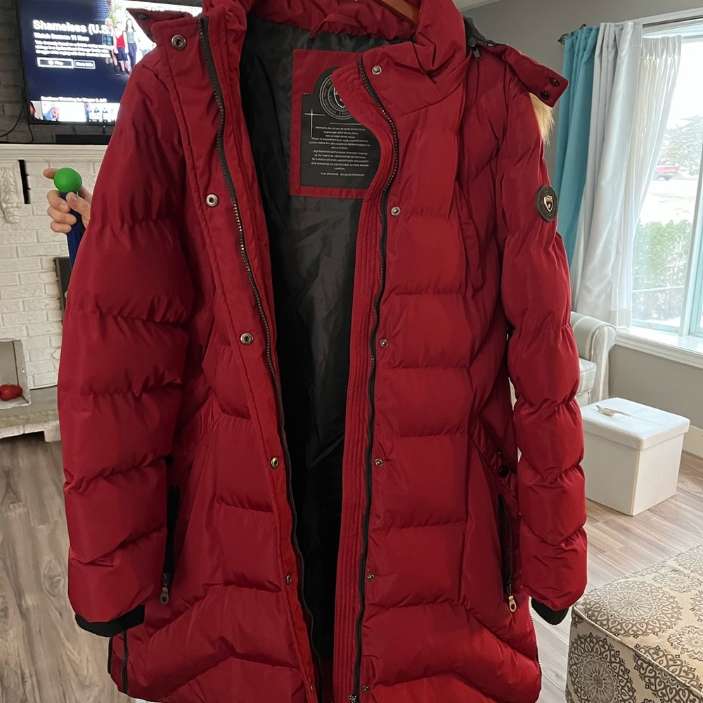 Winter jacket, bought and worn handful of times. Gained weight, no longer fits.